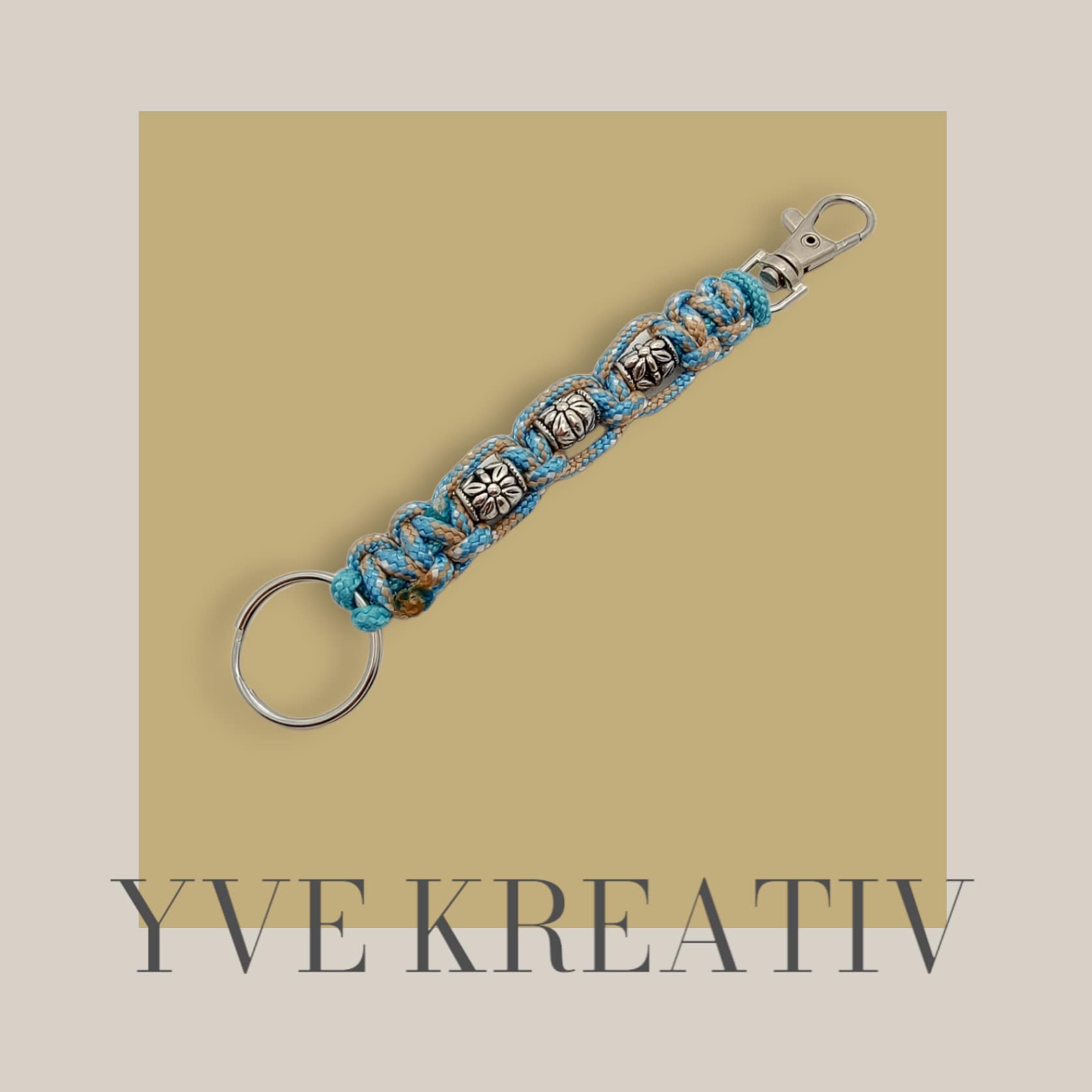 Schlüsselanhänger mit Metallperlen handgeknotet aus Paracord mit Karabiner + Schlüsselring / Blau - Beige
