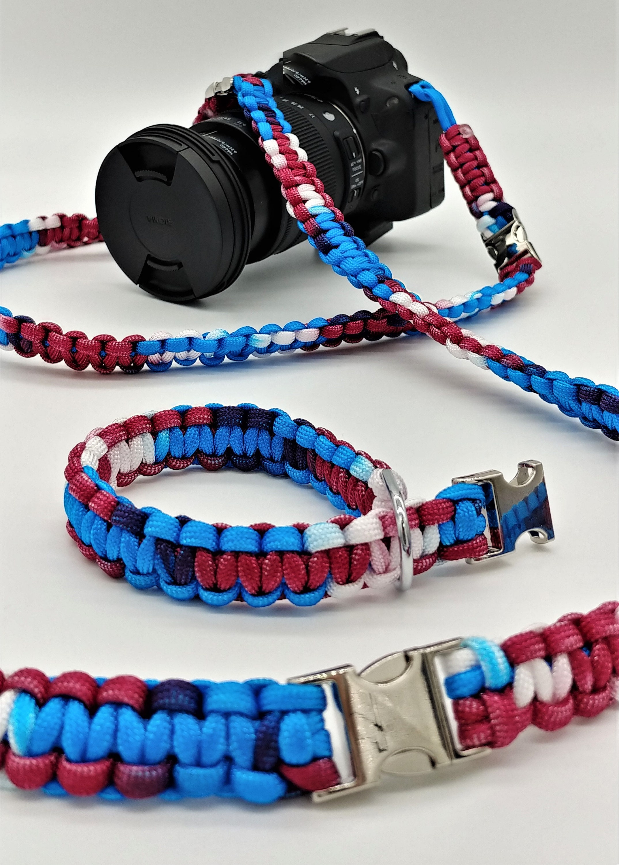 6 tlg. SET Kameragurt inkl. Handschlaufe geknotet aus Parachute Cord (Fallschirmschnur) Kamera Zubehör - Farbe "Galaxy" 6 tlg. SET Kameragurt inkl. Handschlaufe geknotet aus Parachute Cord (Fallschirmschnur) Kamera Zubehör - Farbe "Galaxy"