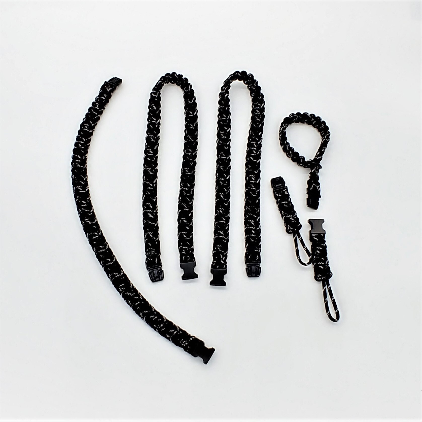 6 tlg. SET Kameragurt inkl. Handschlaufe geknotet aus Parachute Cord (Fallschirmschnur) Kamera Zubehör - Farbe "Schwarz" 6 tlg. SET Kameragurt inkl. Handschlaufe geknotet aus Parachute Cord (Fallschirmschnur) Kamera Zubehör - Farbe "Schwarz"