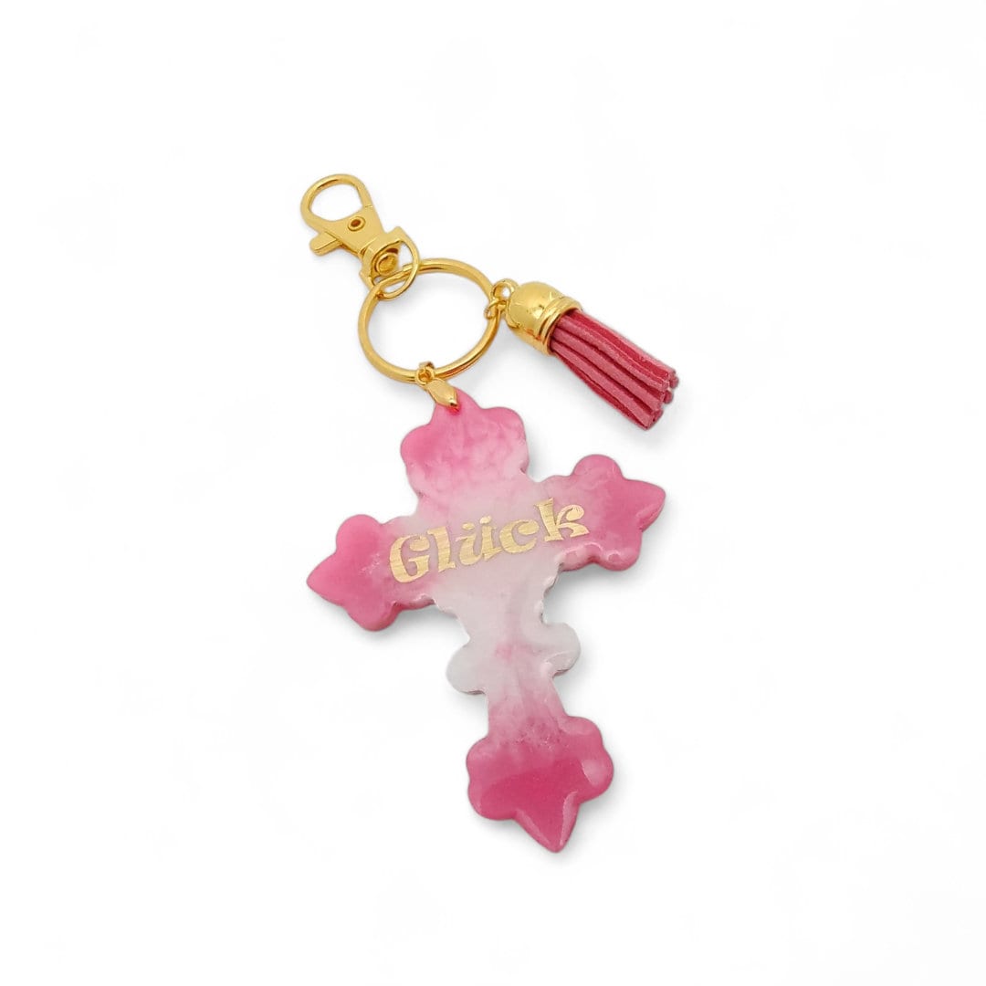 Schlüsselanhänger Kreuz "Glück" aus Epoxidharz mit einer kleinen Quaste und einem Karabiner  #1675260763