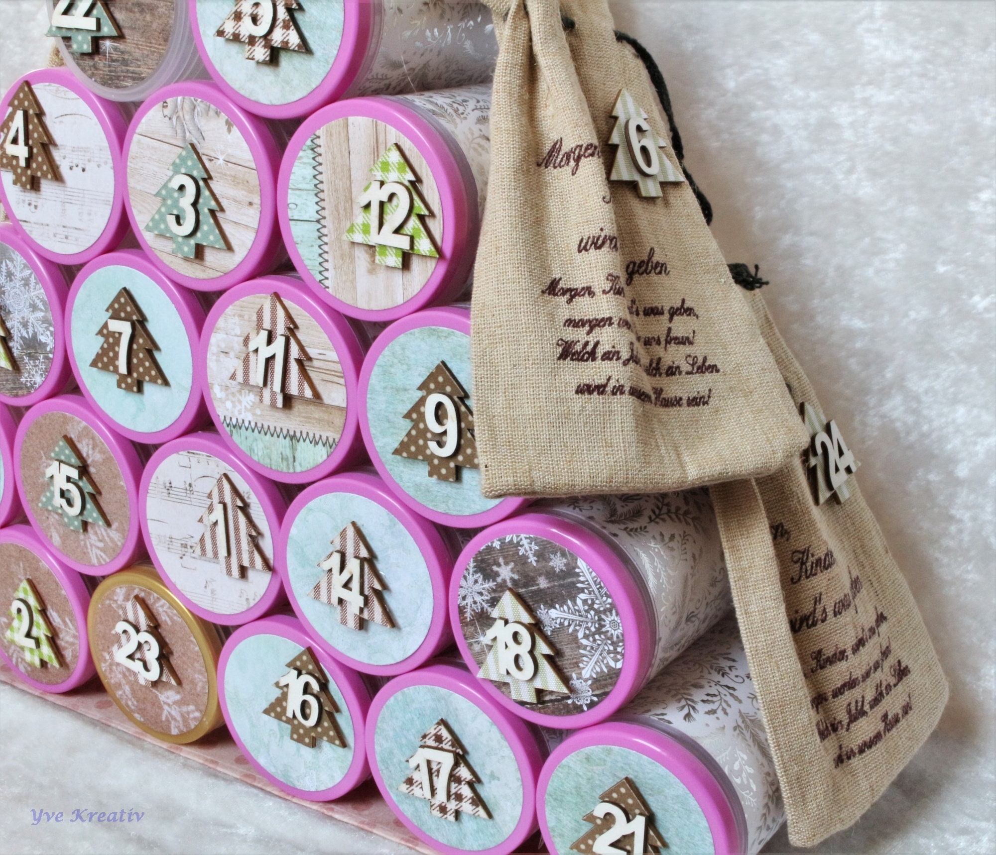 Adventskalender aus Dosen und Jutesäckchen Adventskalender aus Dosen und Jutesäckchen